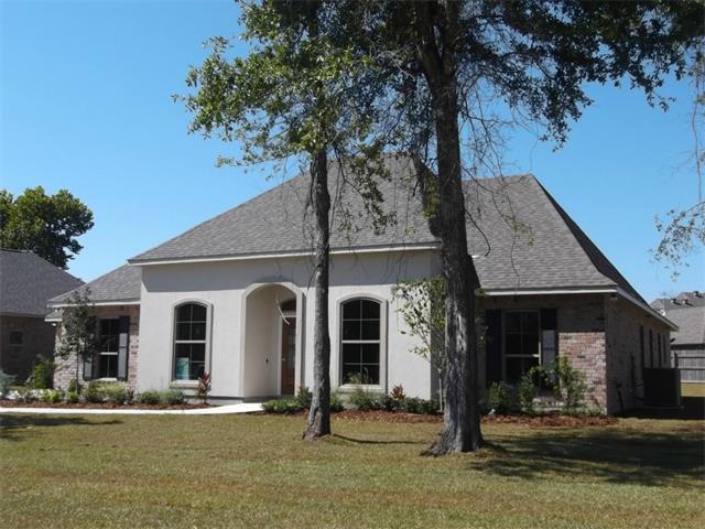 Four bedroom custom Slidell home with beautiful amenities.
